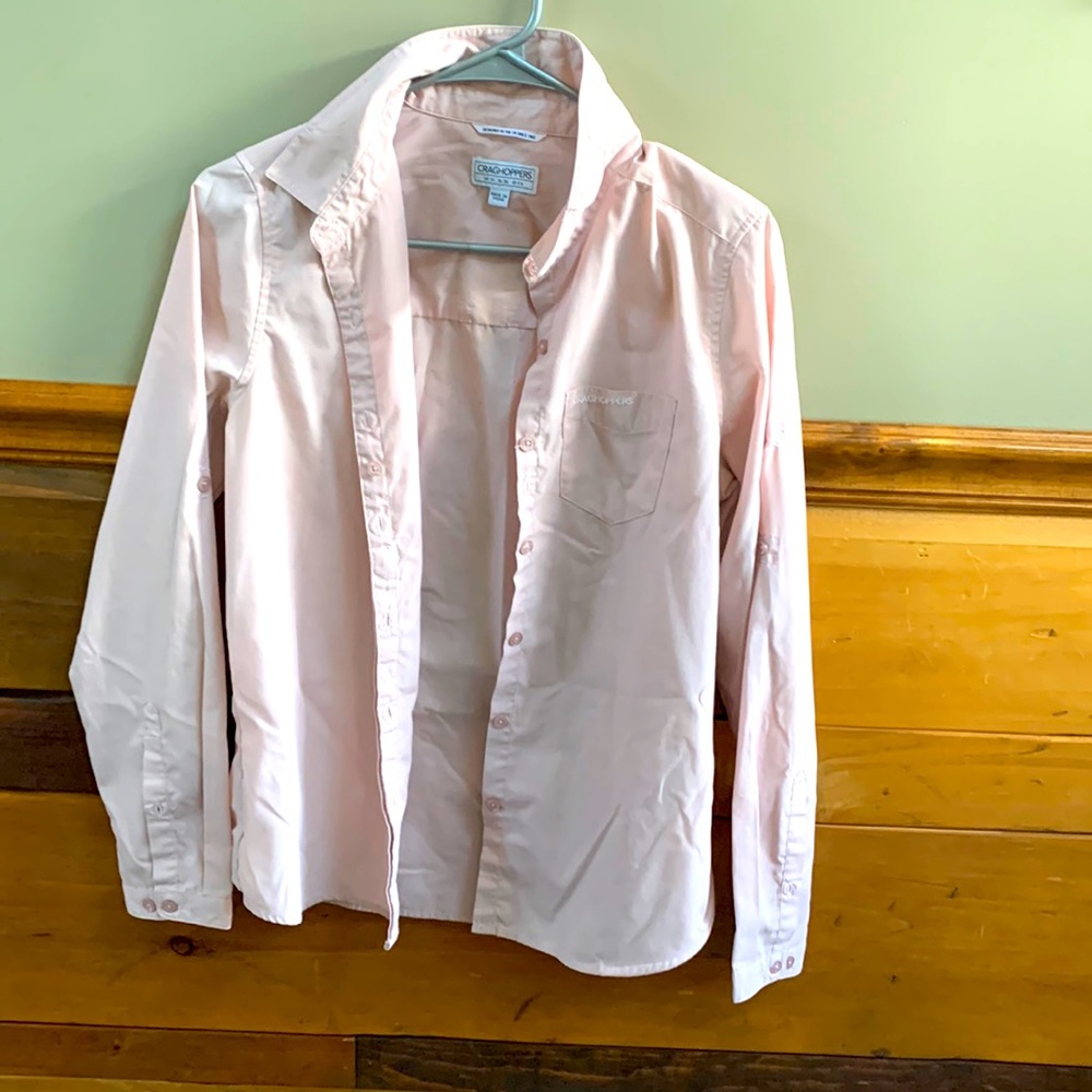 Light pink button up blouse.